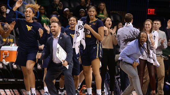 Martin scores 29, West Virginia upends No. 12 Texas women