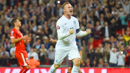 Rooney breaks scoring record as England top Switzerland