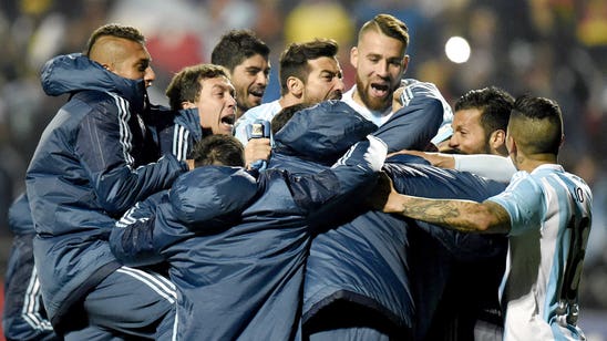 Tevez converts decisive penalty to lift Argentina past Colombia