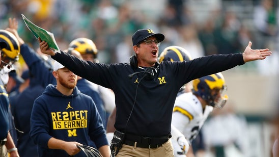 Jim Harbaugh has hat-throwing meltdown on officials during Maryland game