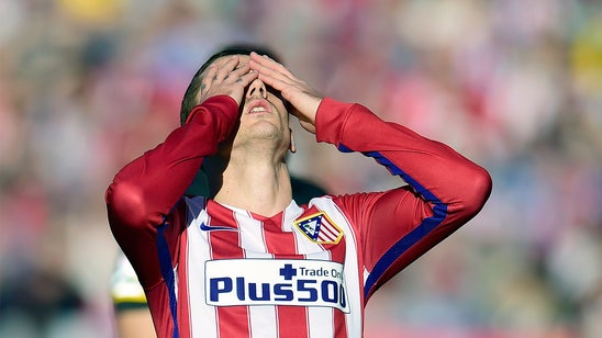 Atletico miss chance to go top of La Liga with draw at Sevilla
