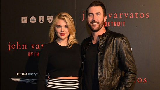 Justin Verlander, Kate Upton share kiss while hanging off tower