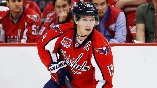 Nicklas Backstrom wears 'contact' red at practice