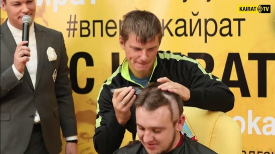 Watch Andrey Arshavin shave a blogger's head after winning a bet