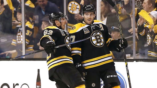 New Bruins join old faces at first informal skate
