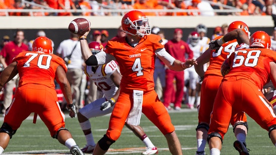 OSU and OU senior quarterbacks will start the season on the bench