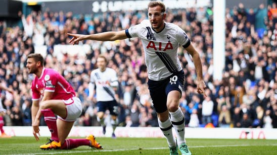 Kane brace helps Tottenham close gap on leaders Leicester