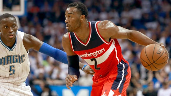 Wall hits winner as Wizards rally for season-opening win at Orlando
