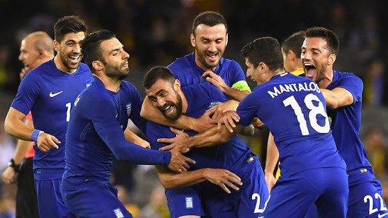 Greece's Maniatis scores vs. Australia from inside his own half