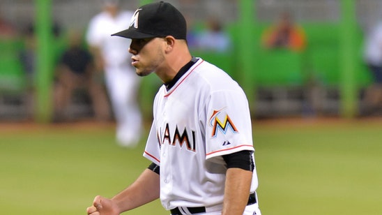 Fernandez improves to 14-0 at home, Marlins blank Reds