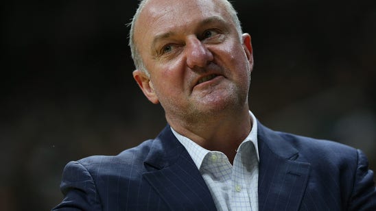 Ohio State coach Thad Matta modeled the Buckeyes' new uniforms