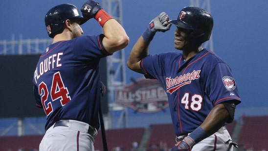 Twins outlast Reds, 8-5