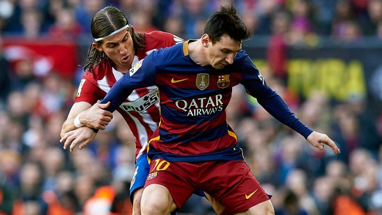 World reacts to Filipe Luis' criminal tackle on Lionel Messi