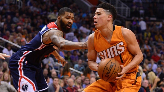 Morris shines in return as Wizards dump Suns