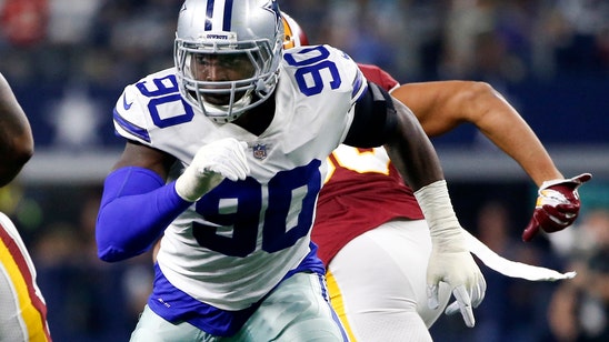 Cowboys putting franchise tag on Lawrence again