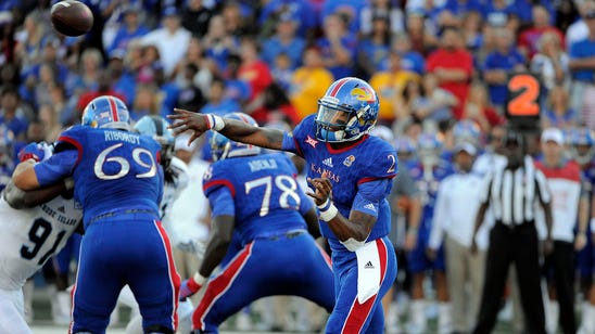 Kansas picks up first win in 665 days with 55-6 rout of Rhode Island