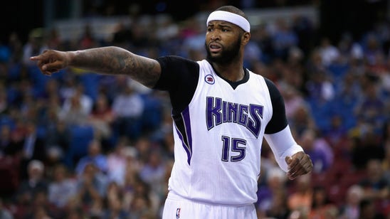 DeMarcus Cousins showed off his janitor skills after Kings-76ers moisture delay