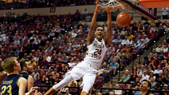 Devin Vassell sparks second-half charge, No. 18 Florida State holds off Notre Dame for 68-61 win