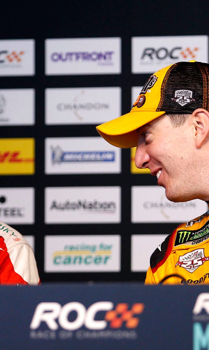 Kyle Busch trades helmets with Sebastian Vettel after Race ...