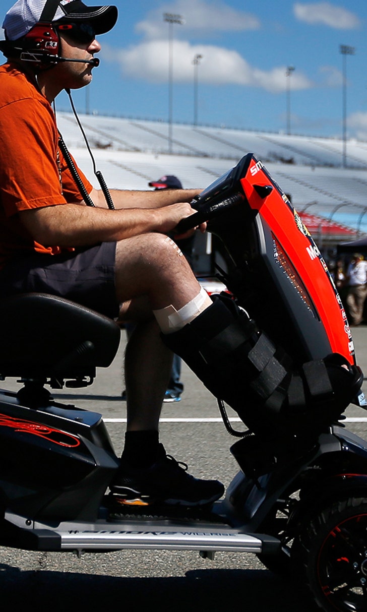 Tony Stewart's smokin' custom scooter rolls through BarrettJackson