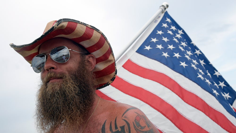 The Latest: Rain postpones NASCAR race at Daytona a day