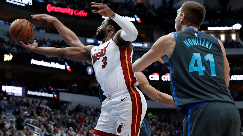 Wade helps Heat top Mavs 112-101 in likely final Dallas game