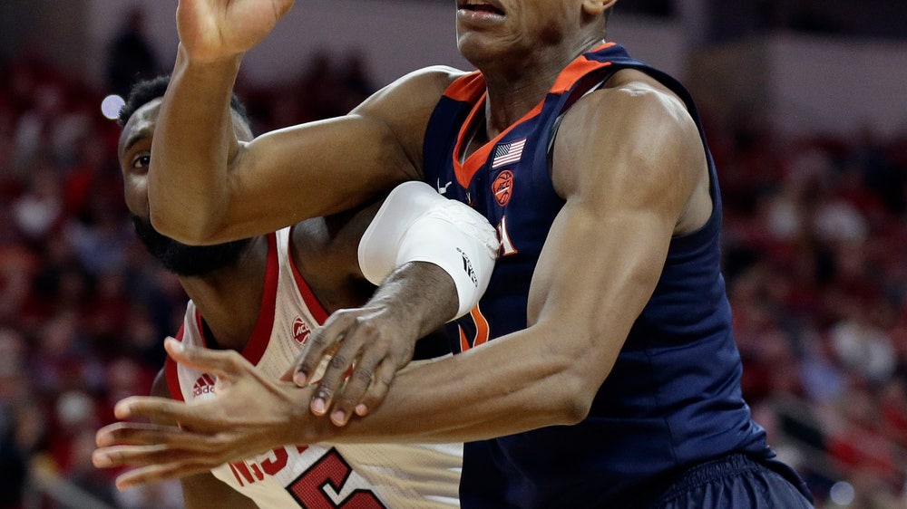 No. 3 Virginia outlasts No. 23 NC State 66-65 in overtime