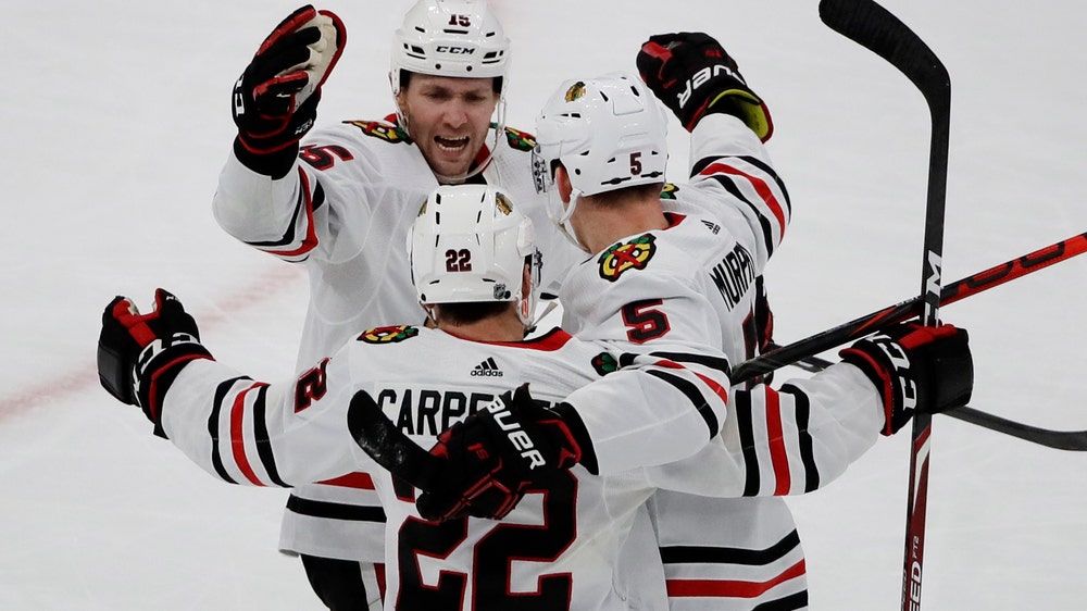 Blackhawks recover, beat Bruins 4-3 in OT