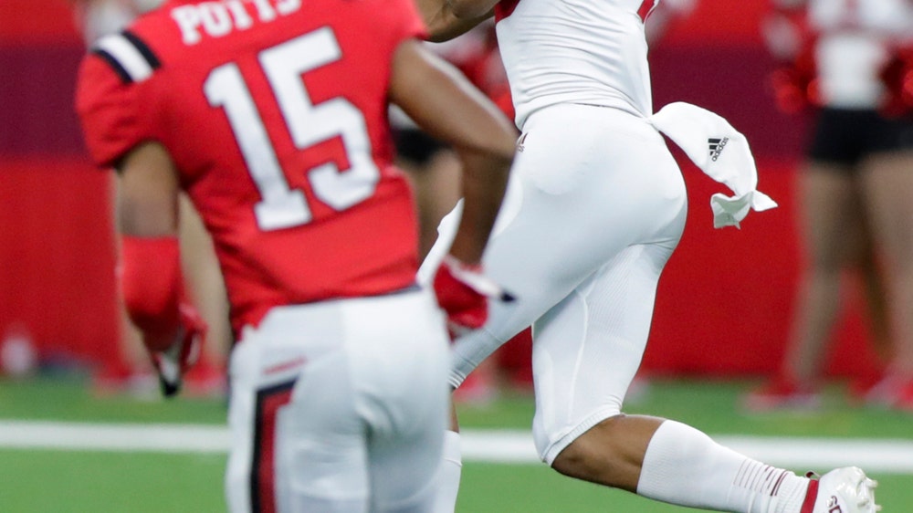 Penix helps Hoosiers hold on for 34-24 victory over Ball St.