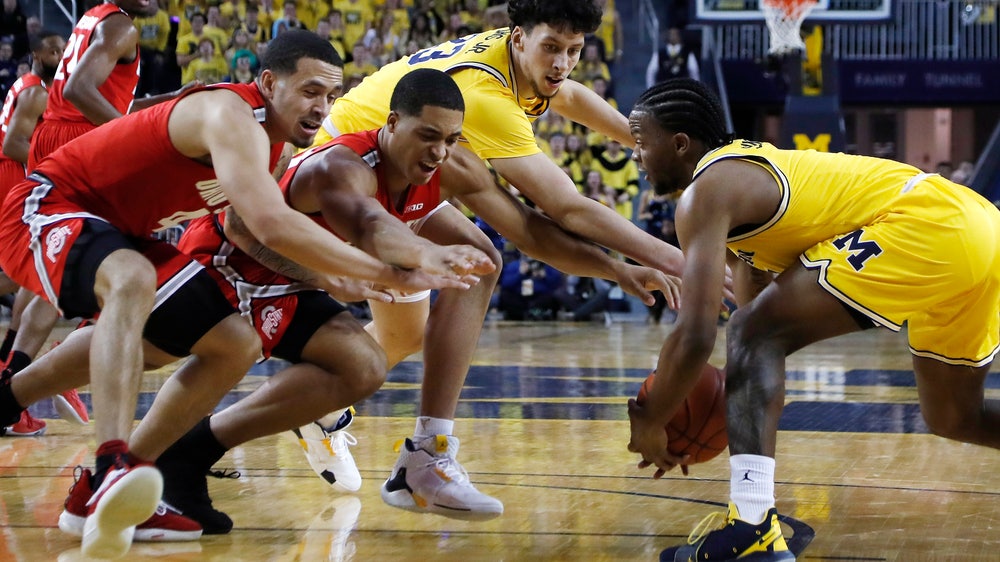 Simpson’s triple-double lifts No. 5 Michigan over Ohio State