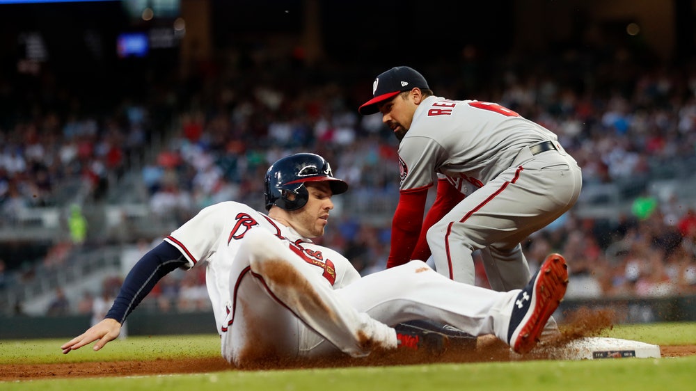 Strasburg strikes out 11, Nationals hold off Braves 5-4