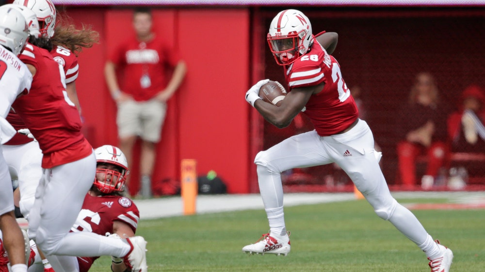 Huskers RB facing porn charges enters game in 3rd quarter