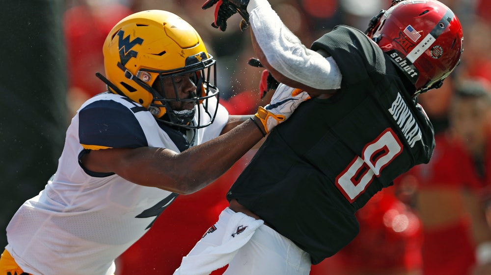 Grier, No. 12 WVU hold on to beat No. 25 Texas Tech, 42-34