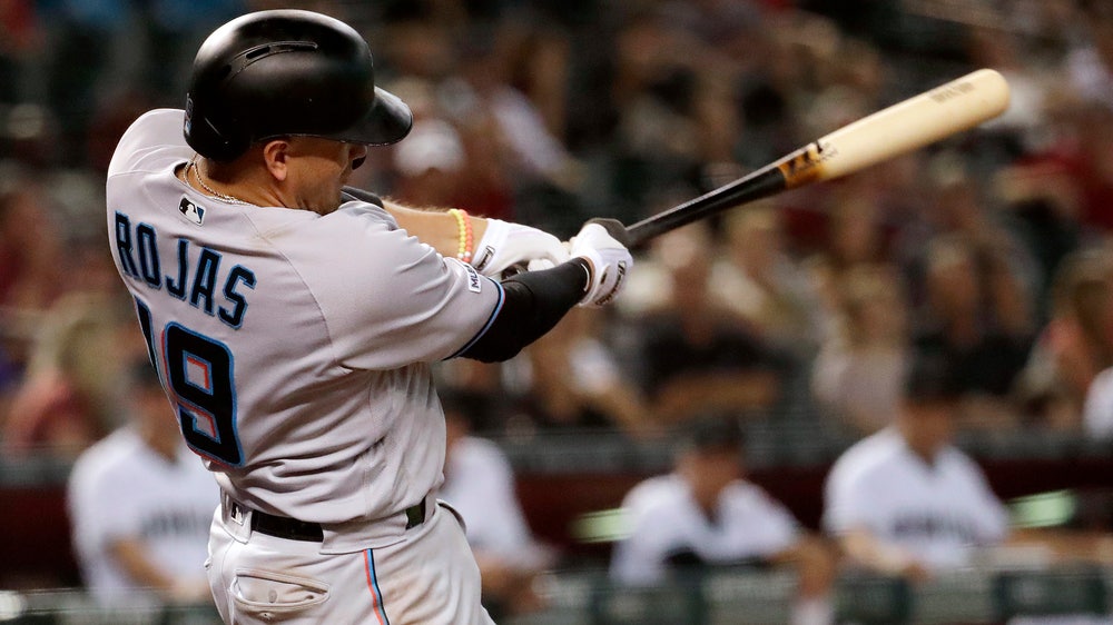 Rojas has 6 RBIs, Marlins power past D-backs 12-6