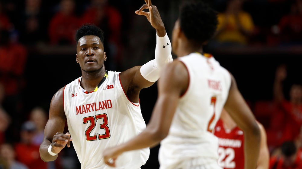 No. 19 Maryland squeezes past Wisconsin 64-60