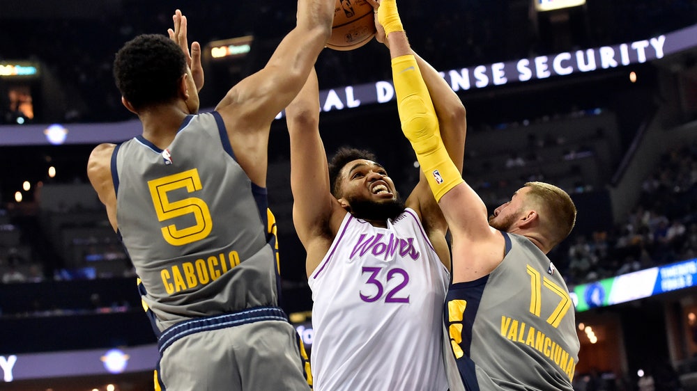 Towns has 33 points, 23 boards to lift Wolves over Memphis