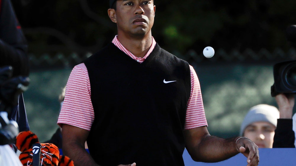 Woods finds a consolation prize without contending at Torrey