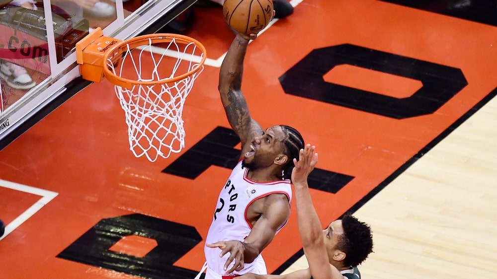 Leonard scores 36, Raptors beat Bucks 118-112 in 2 OTs