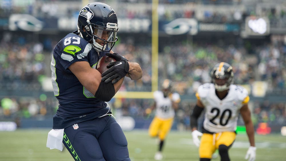Wilson's 5 TDs lead Seattle past Pittsburgh 39-30