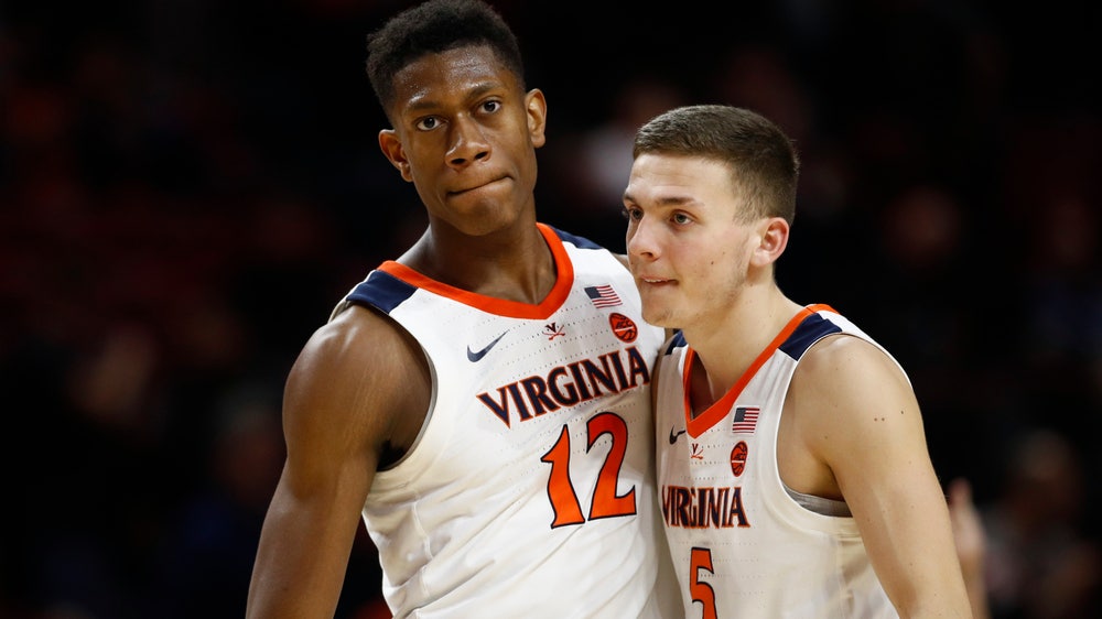 Guy scores 18, No. 4 Virginia outlasts No. 24 Maryland
