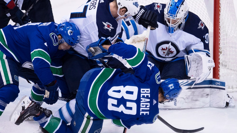 Scheifele, Brossoit lead Jets to 1-0 win over Canucks