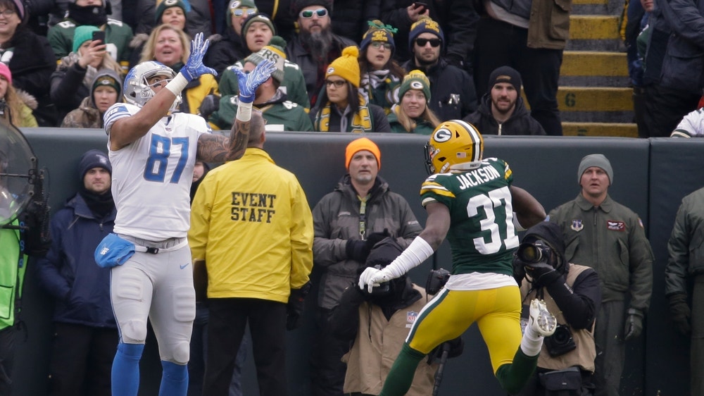 Lions beat up on Packers 31-0; Rodgers suffers concussion
