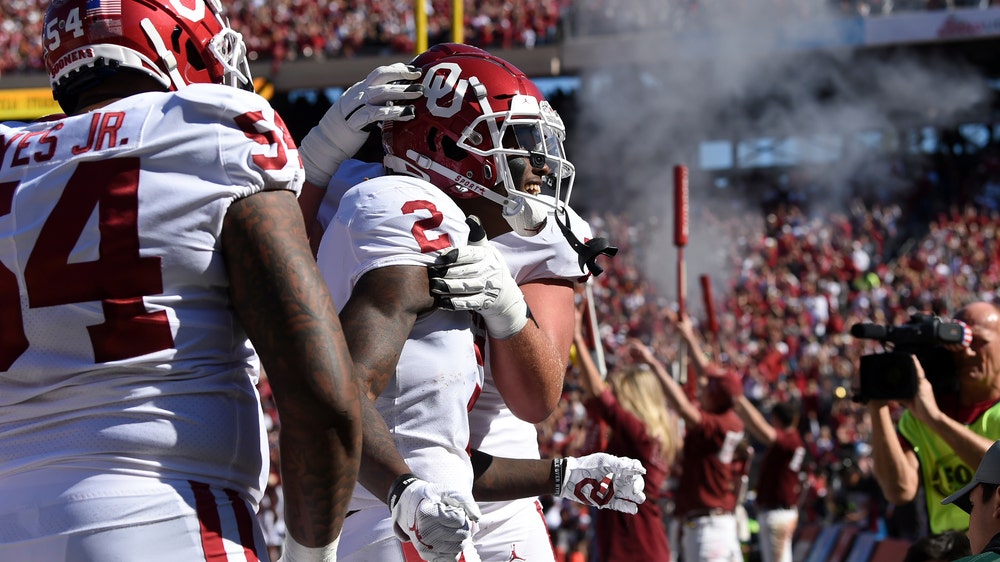 Lamb TDs, defense lift No. 6 OU past 11th-ranked Texas 34-27