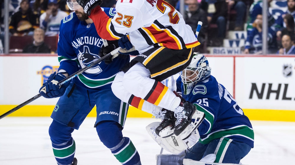 Pettersson scores in shootout, Canucks best Flames 4-3