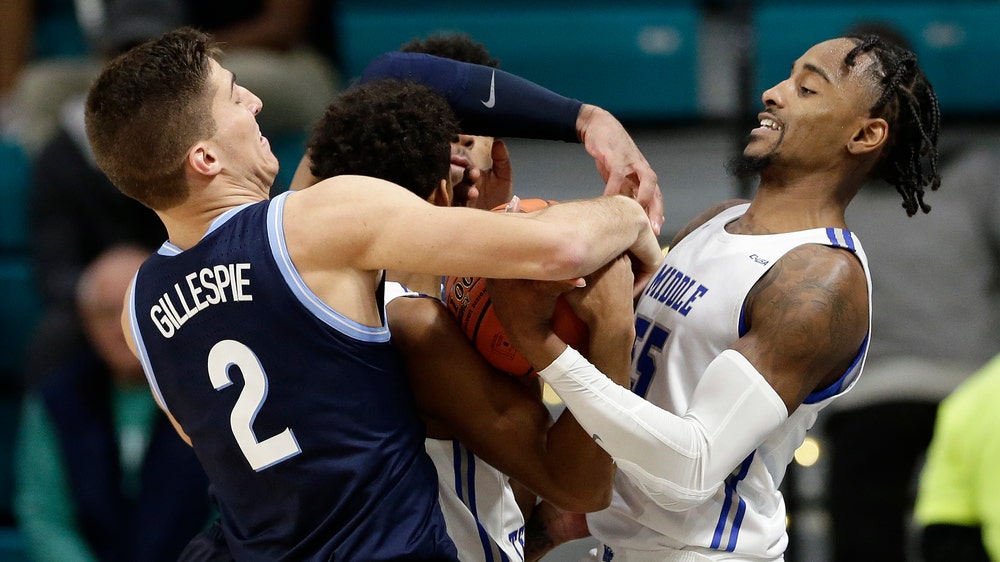 Ewing wins again at MSG, Hoyas beat No. 22 Texas