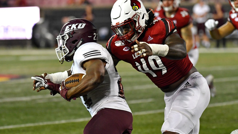 Louisville gets first win for Satterfield, beats EKU 42-0