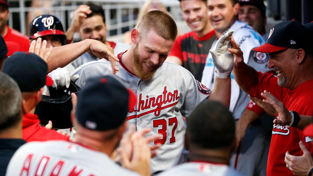 Strasburg hits and pitches Nationals to 13-4 win over Braves