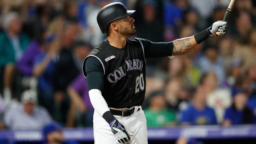 Powerful Rockies rally past Cubs, 9th straight win at home