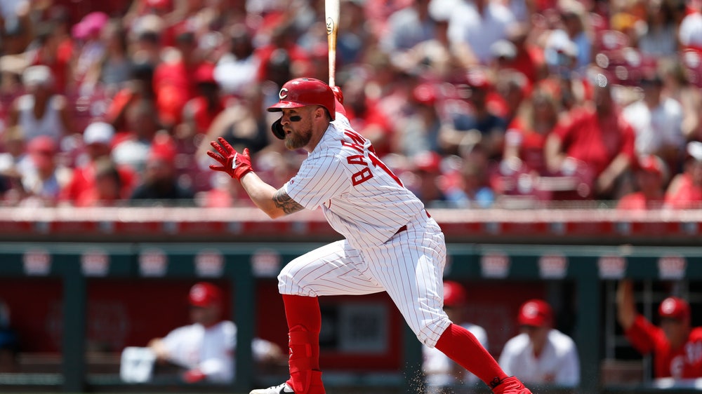 Barnhart RBI single leads Reds to 3-2 win over Rockies