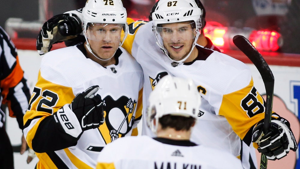 Hornqvist, Kessel each score twice, Penguins beat Flames 9-1